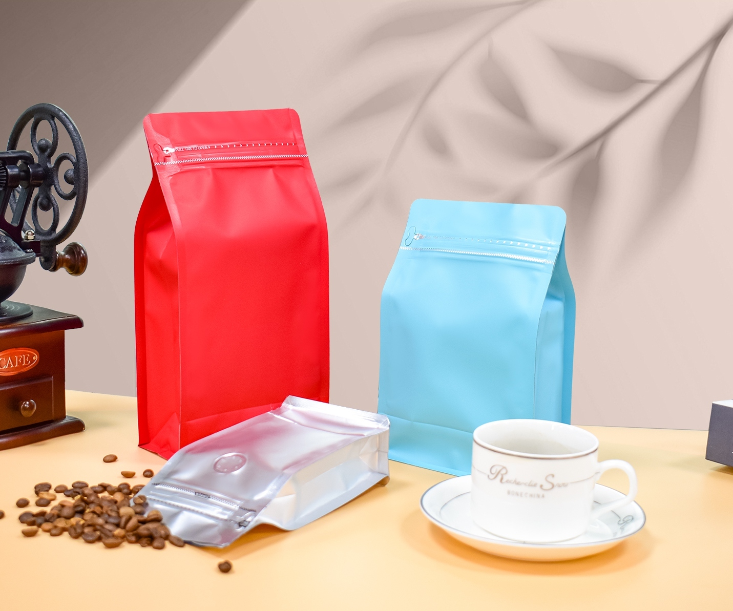 Red, blue and silver flat-bottom coffee bags